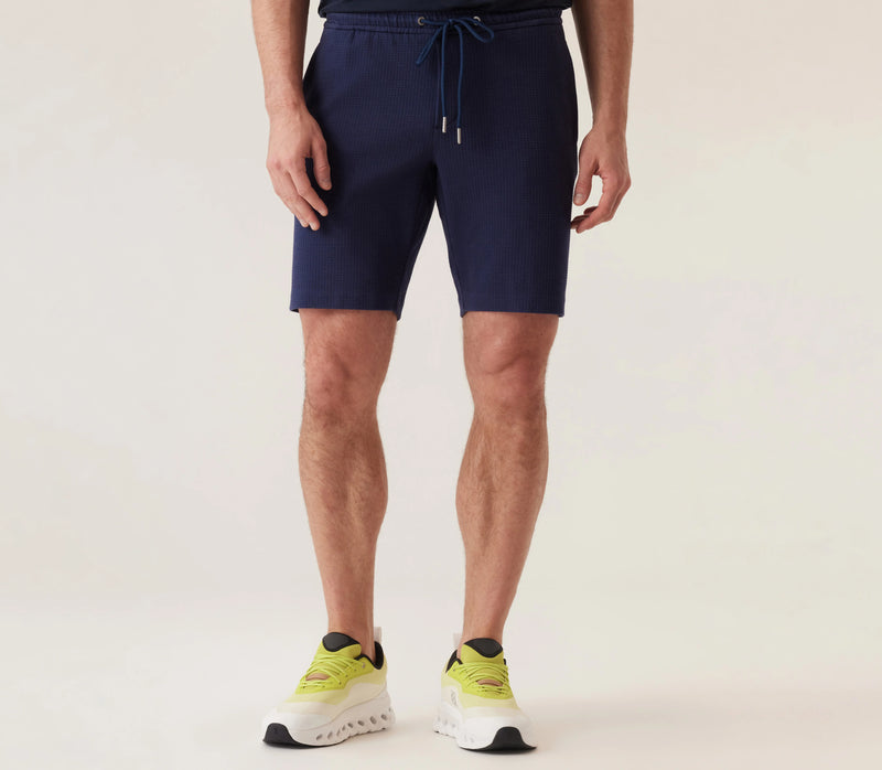 Deke Infinity 360 Cargo Bermuda Shorts In Warp Waffle - Indigo