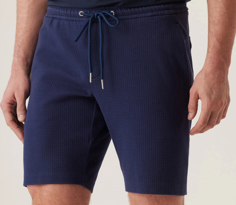 Deke Infinity 360 Cargo Bermuda Shorts In Warp Waffle - Indigo